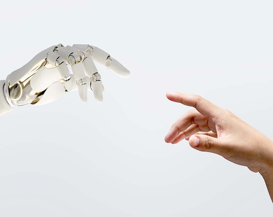 Menschliche Hand berührt Roboterhand – Symbol für KI, ChatGPT und digitale Unterstützung im Coaching
